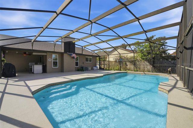 7632 LAKESIDE WOODS DRIVE, Orlando, FL 32810