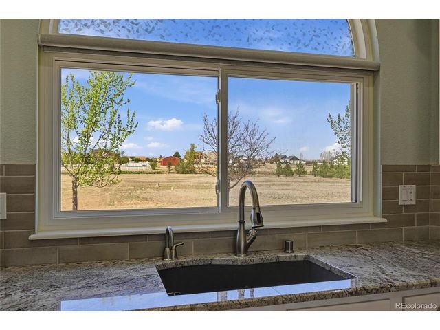 4031 Burton St, Strasburg, CO 80136