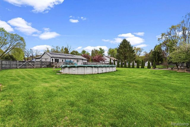 4713 Desert Bridge Court, Highland Charter Township, MI 48356