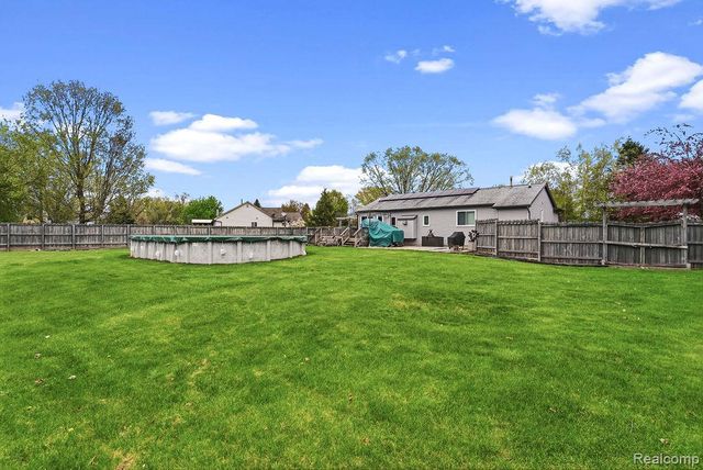 4713 Desert Bridge Court, Highland Charter Township, MI 48356