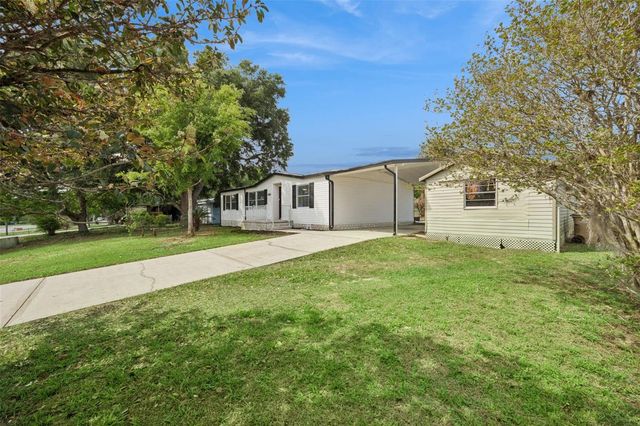 11411 BOBWHITE BOULEVARD, Leesburg, FL 34788