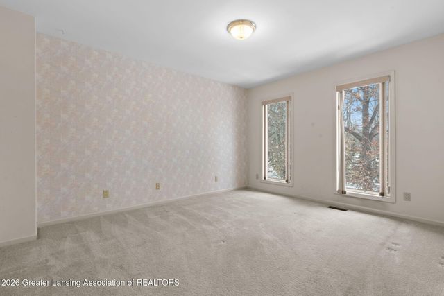 1235 Woodwind Trail, Haslett, MI 48840