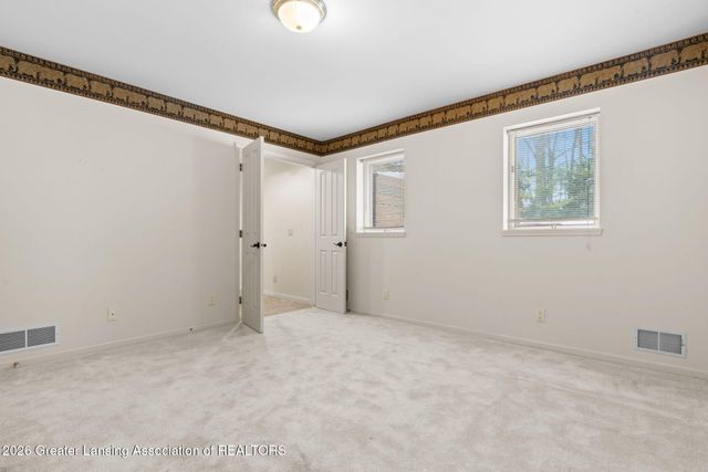 1235 Woodwind Trail, Haslett, MI 48840