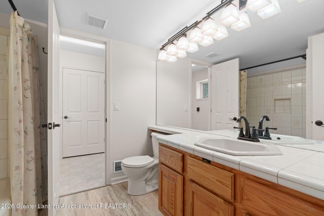 1235 Woodwind Trail, Haslett, MI 48840