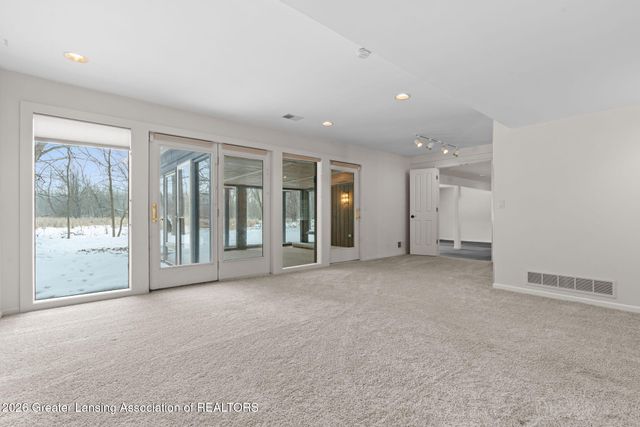 1235 Woodwind Trail, Haslett, MI 48840