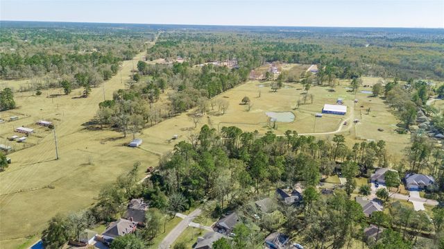 24 Holly Springs Dr, Conroe, TX 77302