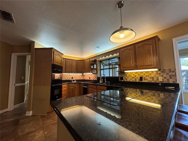 915 HEATHERBROOK DRIVE, Auburndale, FL 33823