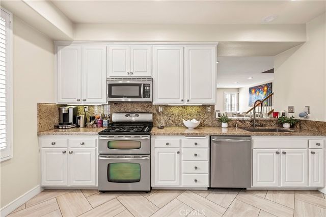 23402 Abbey Glen Place, Valencia, CA 91354