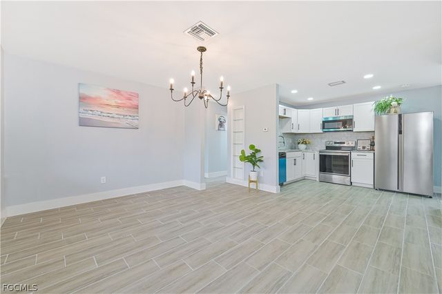 802 Taylor LN, Lehigh Acres, FL 33936