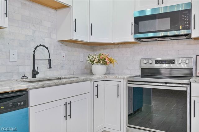 802 Taylor LN, Lehigh Acres, FL 33936