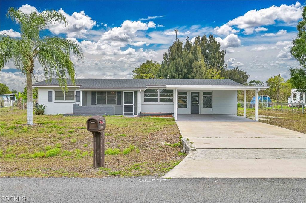 802 Taylor LN, Lehigh Acres, FL 33936