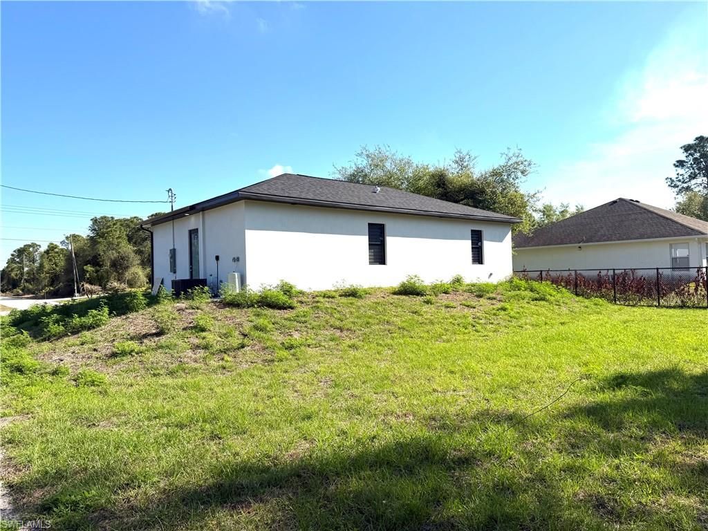 914 Sunrise BLVD, LEHIGH ACRES, FL 33974 — photo 4