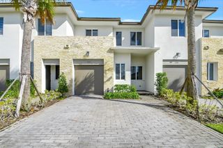 220 Pioneer Way, Royal Palm Beach, FL 33411