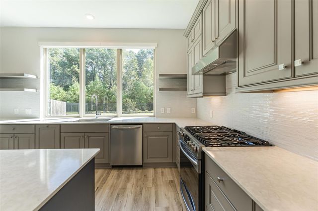 2123 Rosewood Pines Lane, Pinehurst, TX 77362