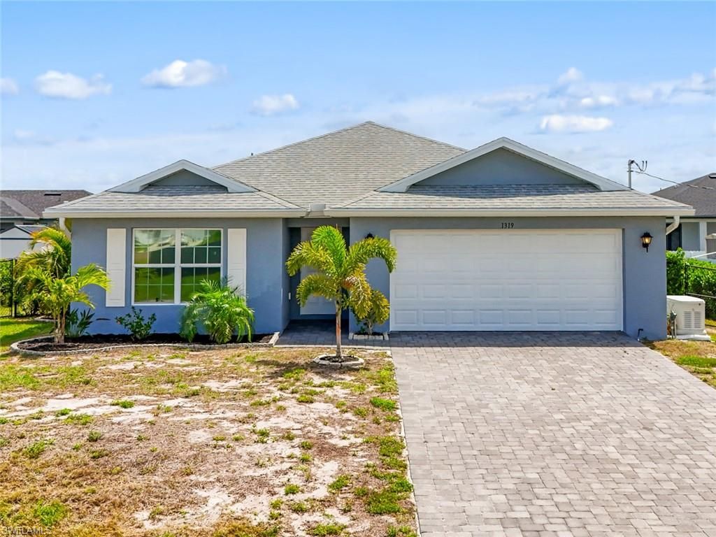Image 2 of property listing at 1319 NW 14th PL, Cape Coral, FL 33993
