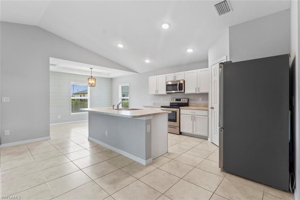 Image 4 of property listing at 1319 NW 14th PL, Cape Coral, FL 33993