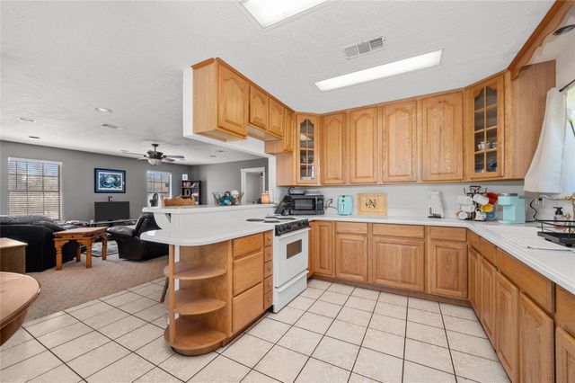 11715 Cherry Point Dr, Mont Belvieu, TX 77535