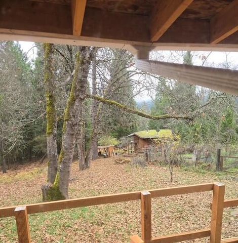 206 Lower Wolf Creek Road, Wolf Creek, OR 97497