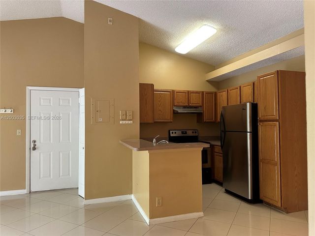 731 Lyons Road 16203, Coconut Creek, FL 33063