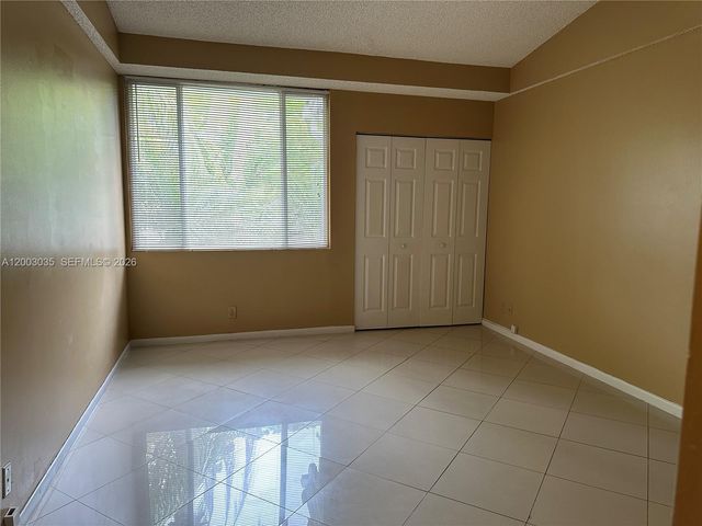 731 Lyons Road 16203, Coconut Creek, FL 33063