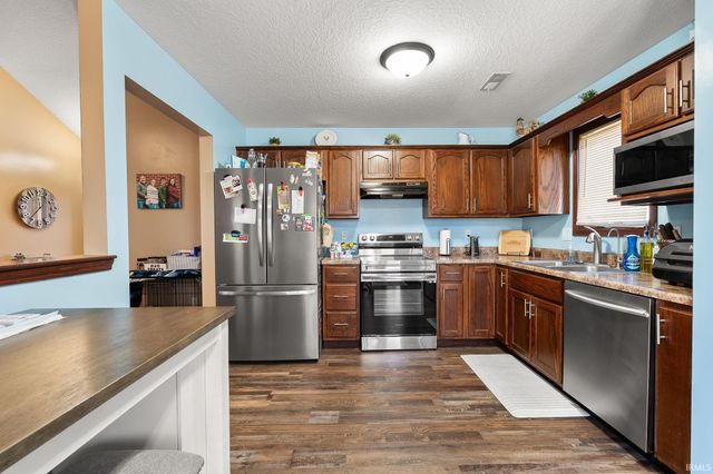 12030 Breezy Knoll Court, Fort Wayne, IN 46818