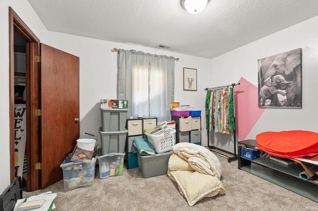 12030 Breezy Knoll Court, Fort Wayne, IN 46818