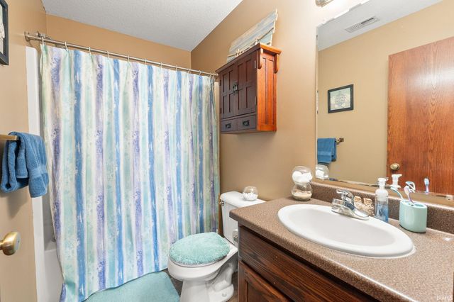 12030 Breezy Knoll Court, Fort Wayne, IN 46818