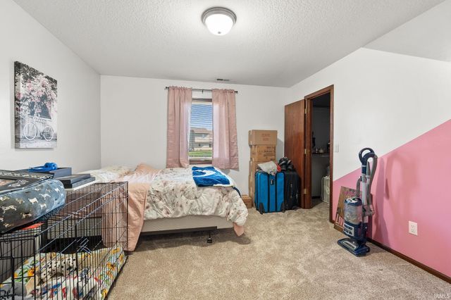 12030 Breezy Knoll Court, Fort Wayne, IN 46818