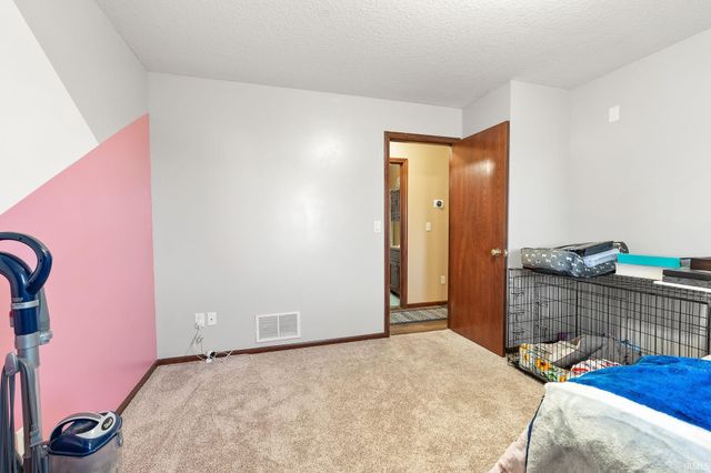 12030 Breezy Knoll Court, Fort Wayne, IN 46818