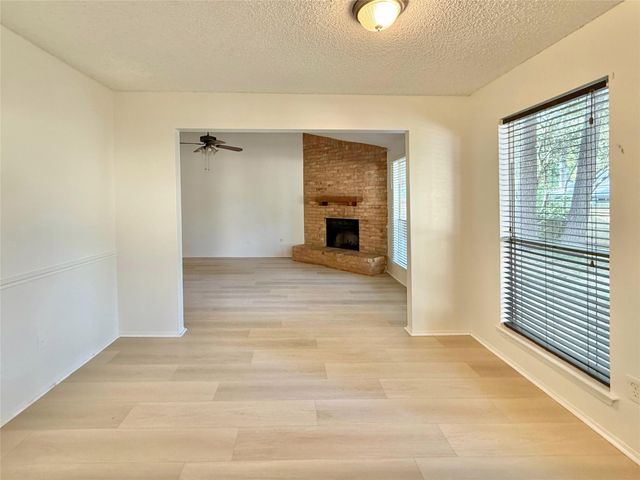 6 Maywind Court, The Woodlands, TX 77381