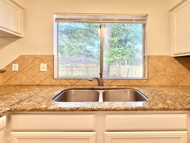 6 Maywind Court, The Woodlands, TX 77381