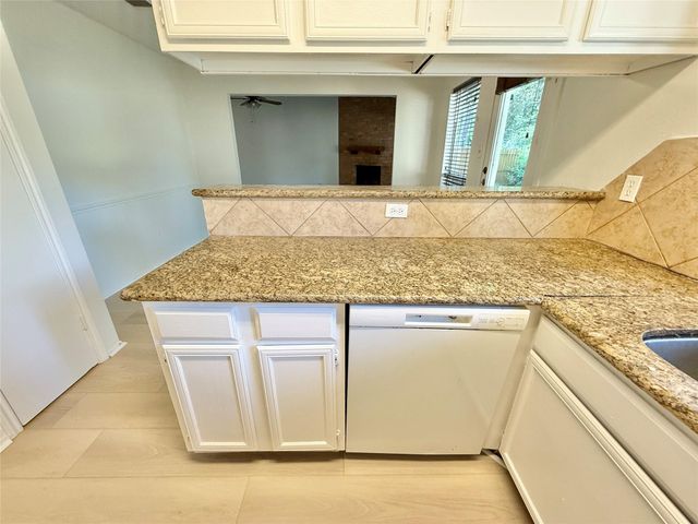 6 Maywind Court, The Woodlands, TX 77381