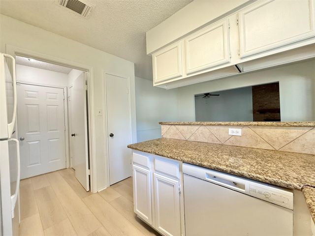 6 Maywind Court, The Woodlands, TX 77381