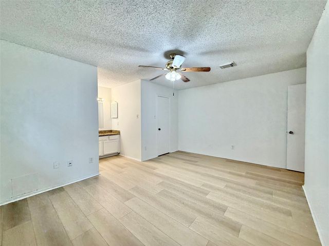 6 Maywind Court, The Woodlands, TX 77381