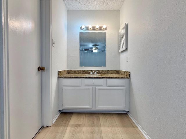 6 Maywind Court, The Woodlands, TX 77381