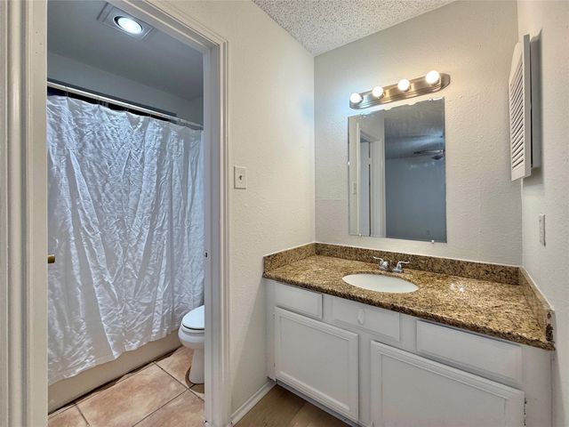 6 Maywind Court, The Woodlands, TX 77381