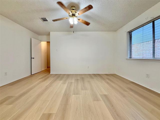 6 Maywind Court, The Woodlands, TX 77381