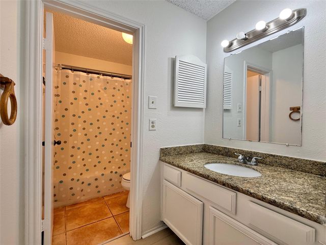 6 Maywind Court, The Woodlands, TX 77381