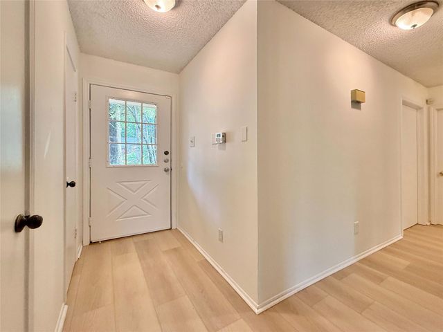 6 Maywind Court, The Woodlands, TX 77381