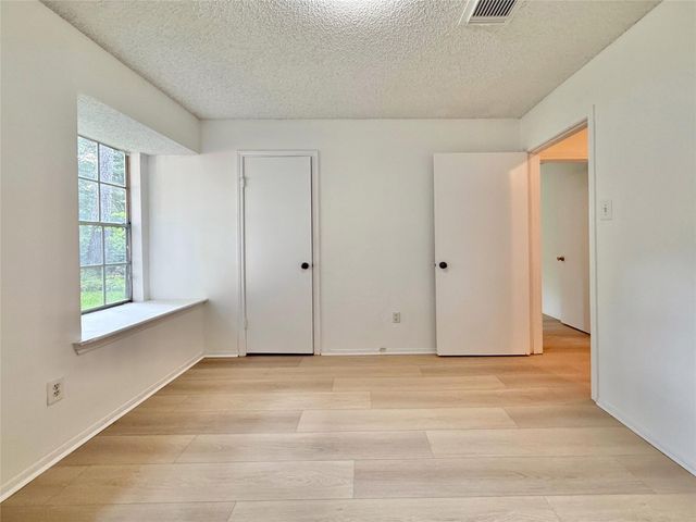 6 Maywind Court, The Woodlands, TX 77381