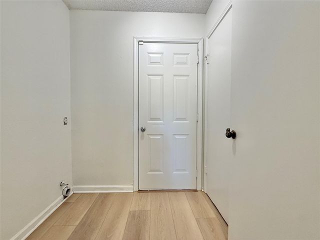 6 Maywind Court, The Woodlands, TX 77381