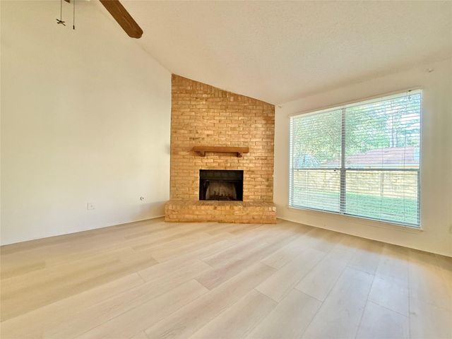 6 Maywind Court, The Woodlands, TX 77381