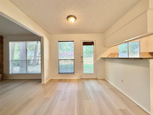 6 Maywind Court, The Woodlands, TX 77381