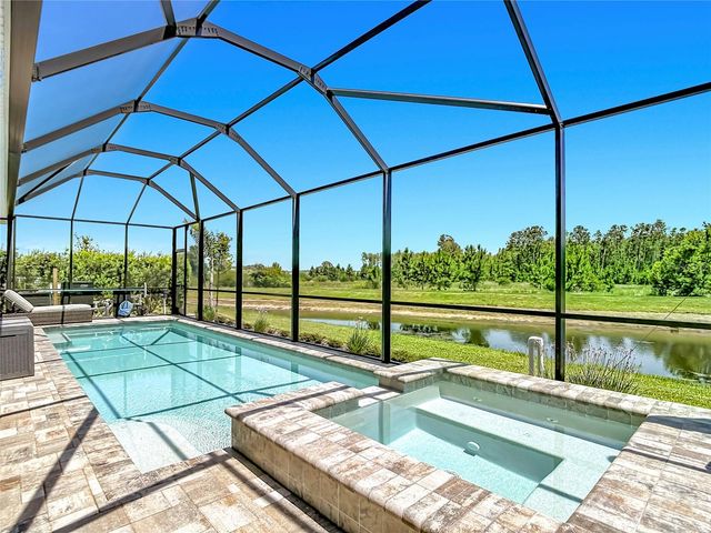 7677 BROAD RIVER AVENUE, Land O Lakes, FL 34638
