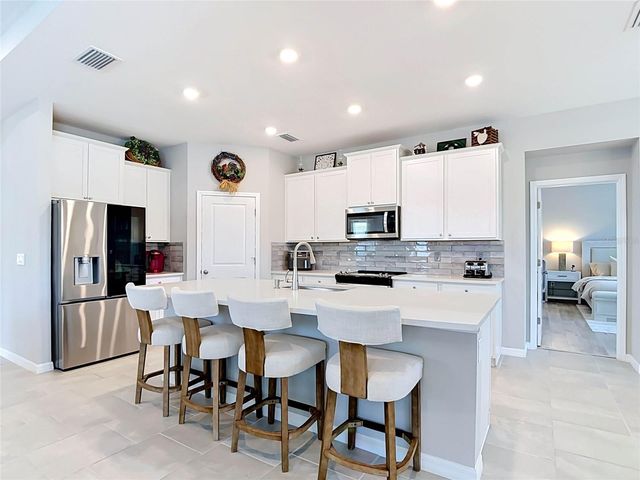 7677 BROAD RIVER AVENUE, Land O Lakes, FL 34638