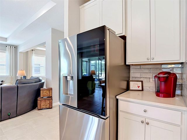 7677 BROAD RIVER AVENUE, Land O Lakes, FL 34638