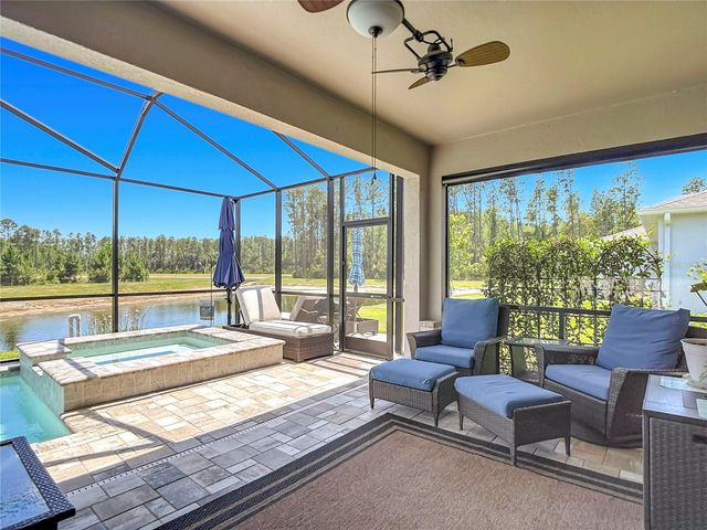 7677 BROAD RIVER AVENUE, Land O Lakes, FL 34638