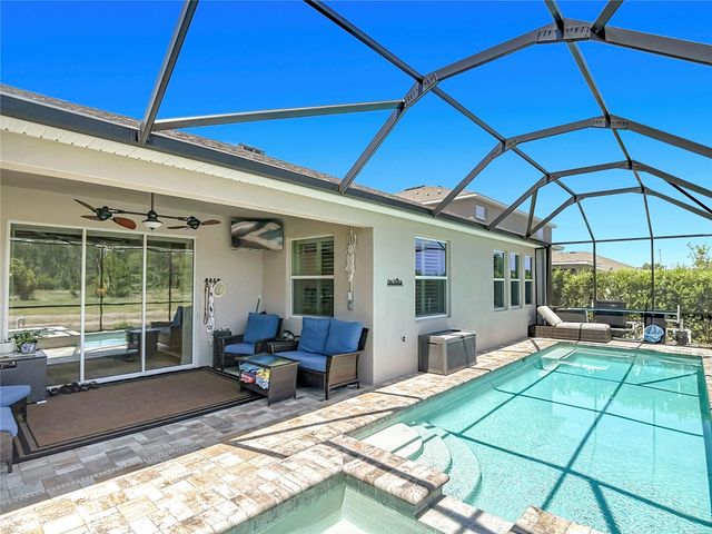 7677 BROAD RIVER AVENUE, Land O Lakes, FL 34638