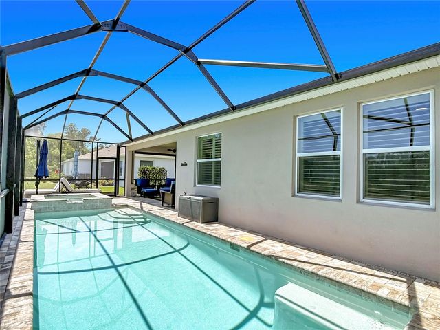 7677 BROAD RIVER AVENUE, Land O Lakes, FL 34638