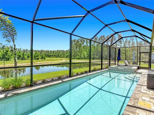 7677 BROAD RIVER AVENUE, Land O Lakes, FL 34638